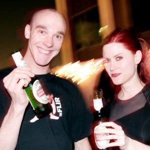 Two people at a show, one of them wearing the Human Heart shirt